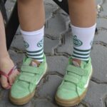 Moda em verde e branco: o estilo dos jaconeros para ver as Esmeraldas