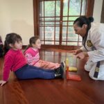 Enquanto o Brasil celebra o ouro mundial, Jacque Ferreira revela sua própria história de superação no taekwondo 